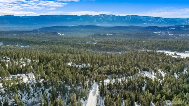 a view of mountain with lake view