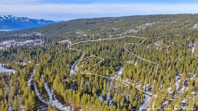 a view of a city with mountains in the background