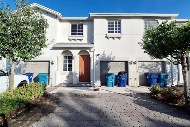 an aerial view of multi story residential apartment building