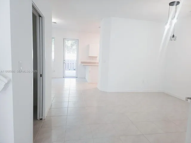 a bathroom with a sink and shower