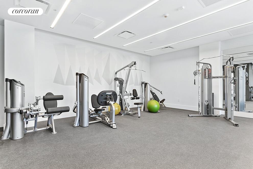 123 Hope Street, Unit 6R Brooklyn, NY 11211 - Photo 10 of 14 a view of a room with gym equipment