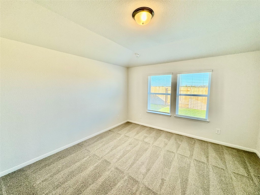 144 Boondoggle Ridge Cedar Creek, TX 78612 - Photo 3 of 7 an empty room with a window