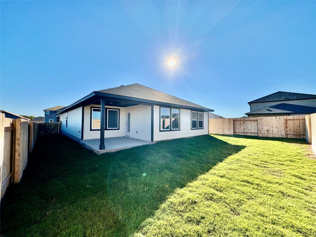 144 Boondoggle Ridge Cedar Creek, TX 78612 - Photo 5 of 7 a house view with a garden space
