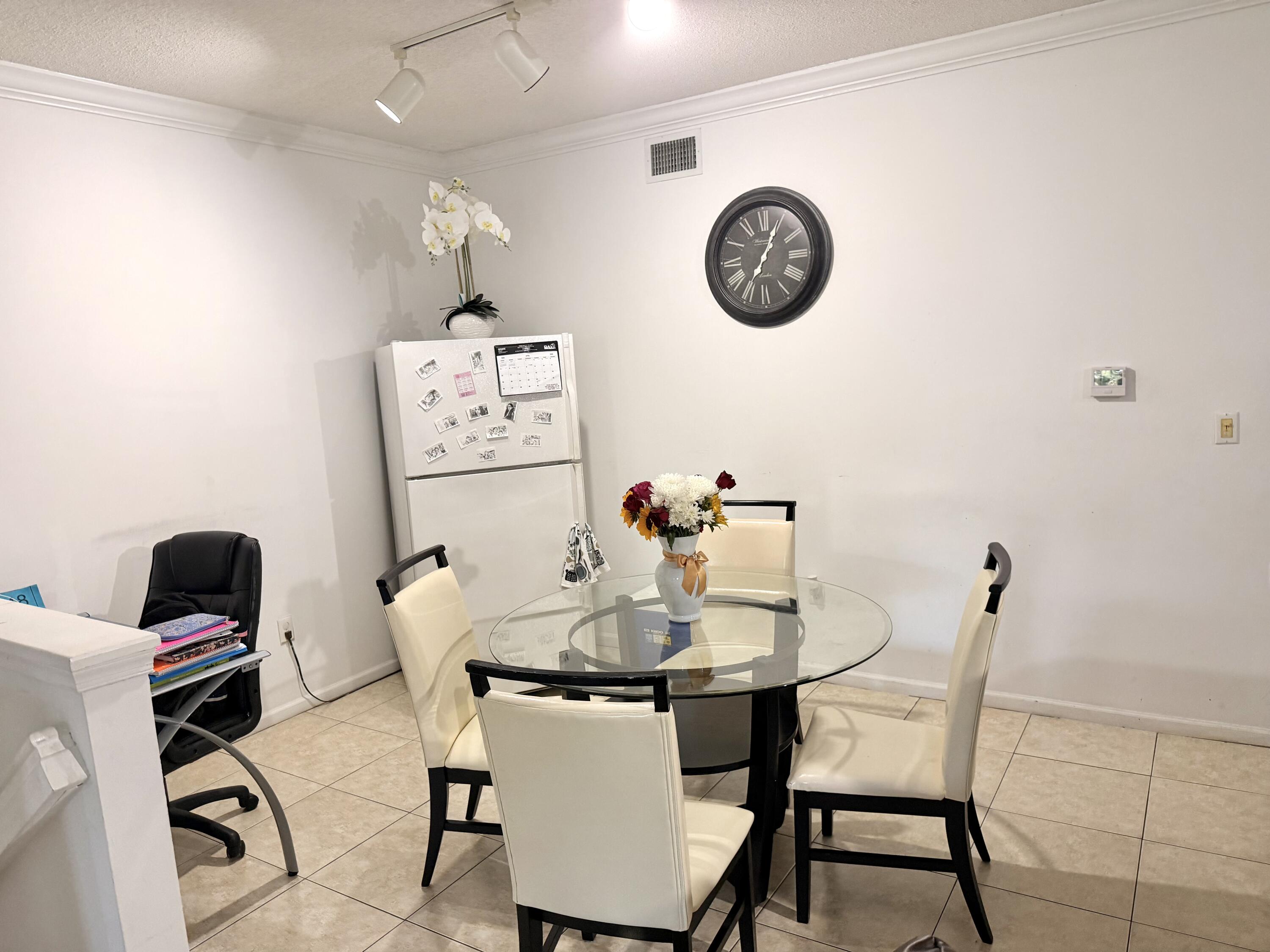 6020 West Sample Road, Unit 303 Coral Springs, FL 33067 - Photo 8 of 17 IMG_4904