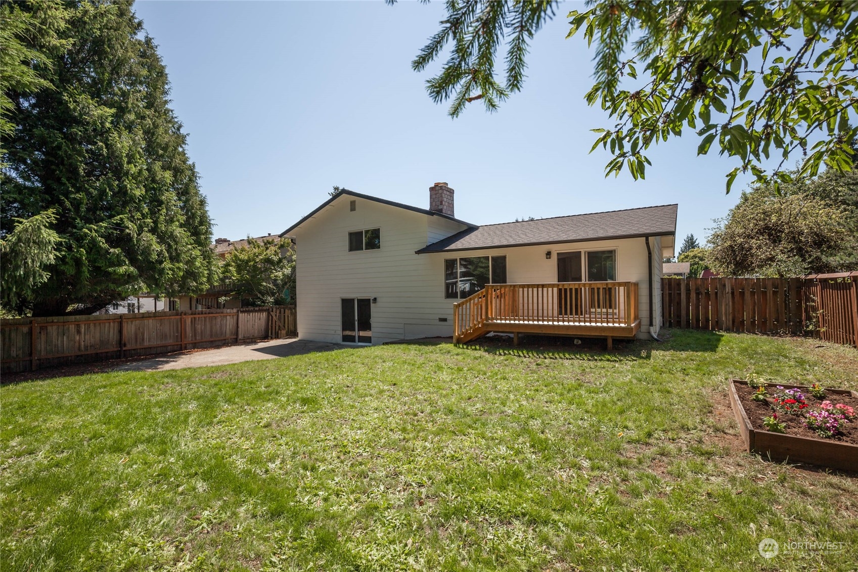4216 Northeast 20th Street Renton, WA 98059 - Photo 21 of 26 a house with a yard