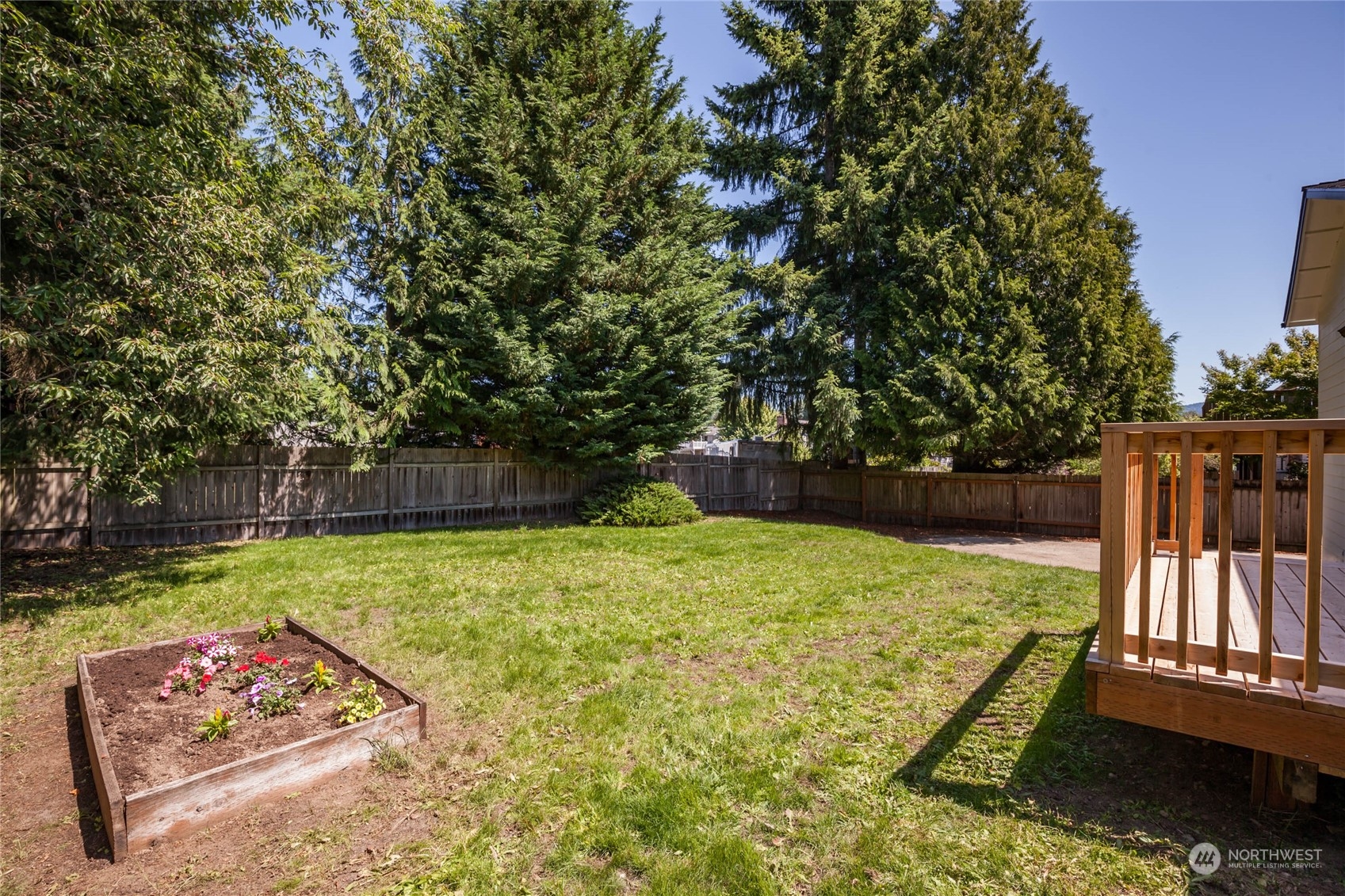 4216 Northeast 20th Street Renton, WA 98059 - Photo 24 of 26 a view of backyard with wooden fence