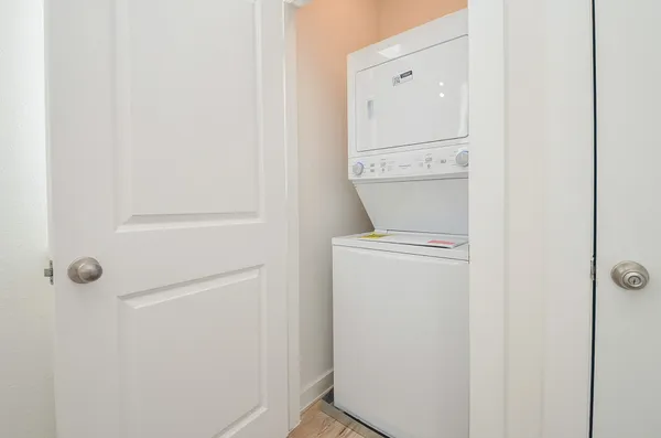 a view of a porch with furniture and stairs