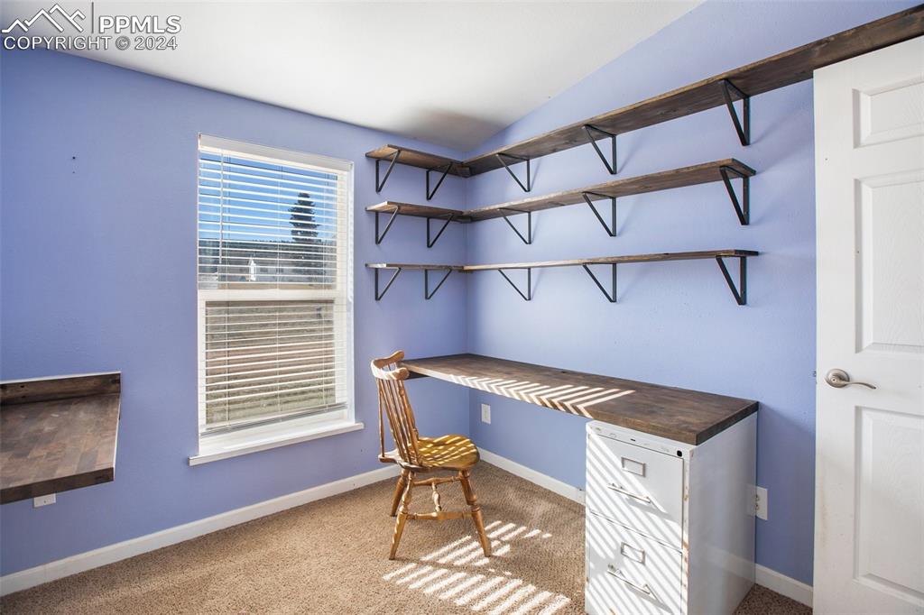 69 Aspen Drive Divide, CO 80814 - Photo 24 of 50 a view of a livingroom with chair and a window