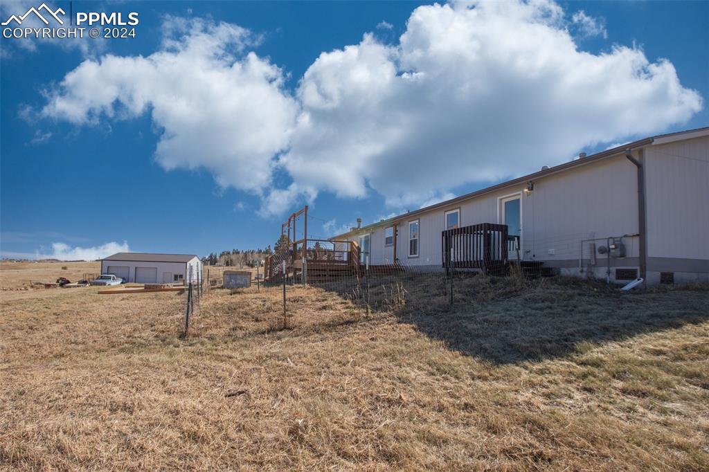 69 Aspen Drive Divide, CO 80814 - Photo 43 of 50 a view of a dry yard with wooden fence