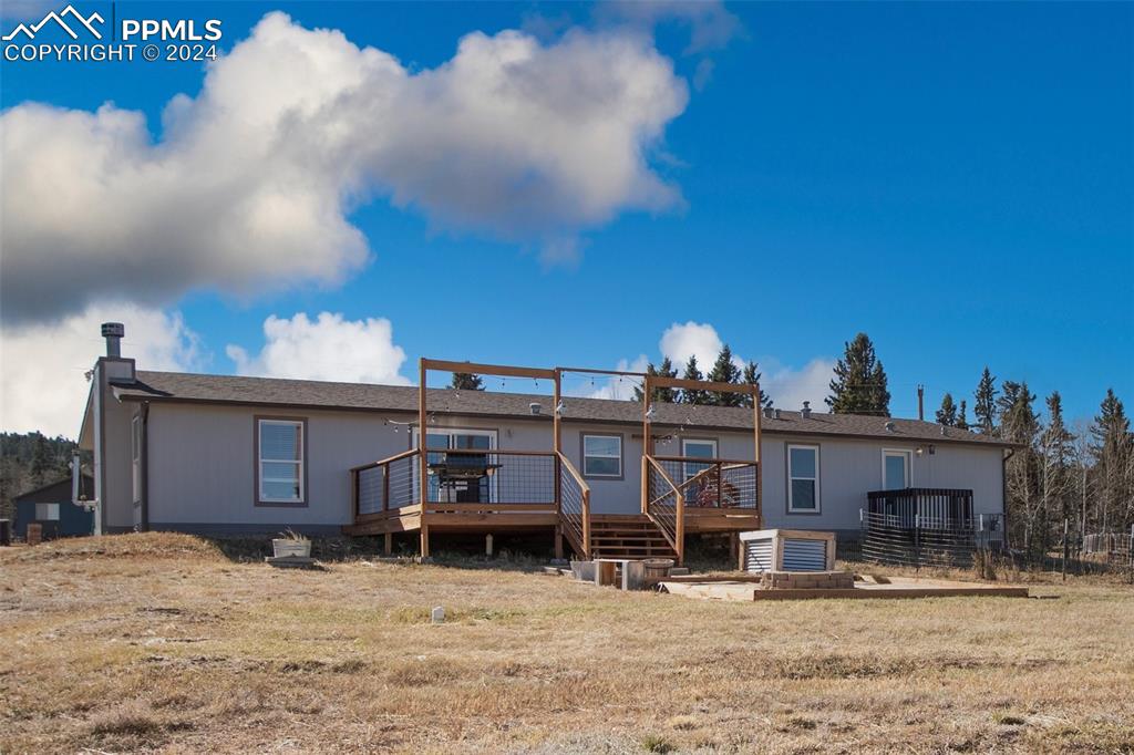 69 Aspen Drive Divide, CO 80814 - Photo 45 of 50 a view of a house with a snow in the yard