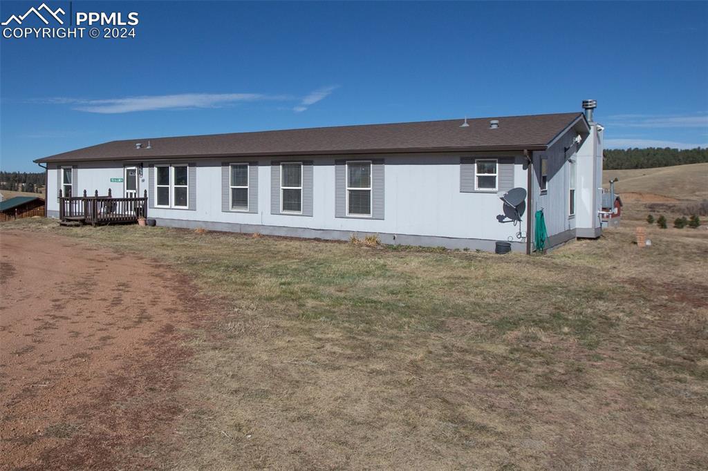 69 Aspen Drive Divide, CO 80814 - Photo 47 of 50 a view of a house with a big yard