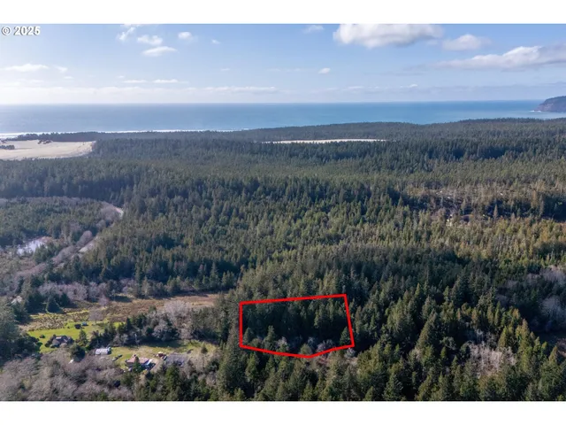 a view of sunset and green field