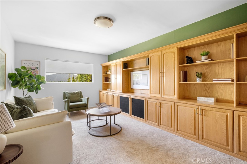 3404 Markridge Road La Crescenta, CA 91214 - Photo 16 of 67 Warm, comfortable den with wall-to-wall built in storage and entertainment opportunities