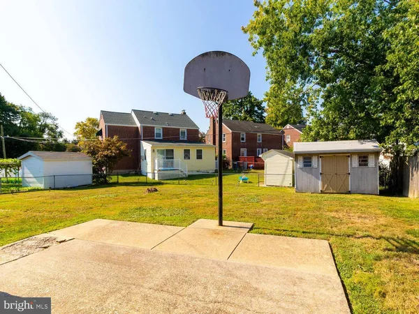 a front view of house with yard swimming pool and seating