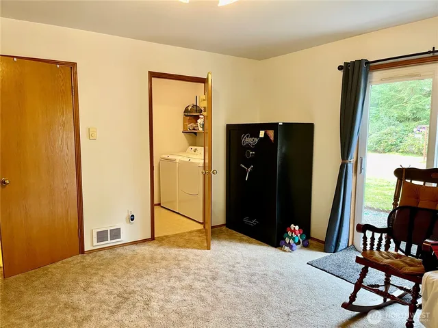 a bathroom with a shower and a sink