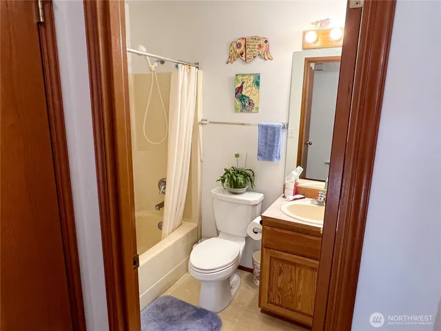 a view of a car parked in front of a house