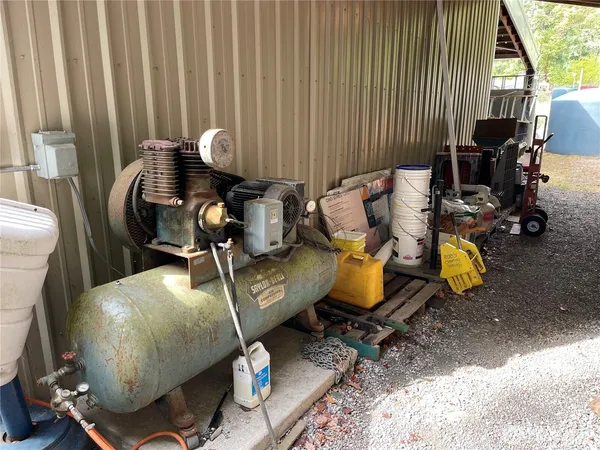 a view of a car parked in front of a house