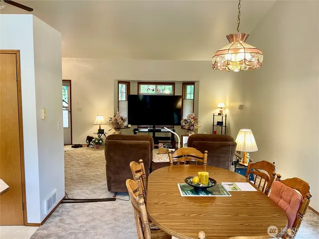 a view of a livingroom with a staircase