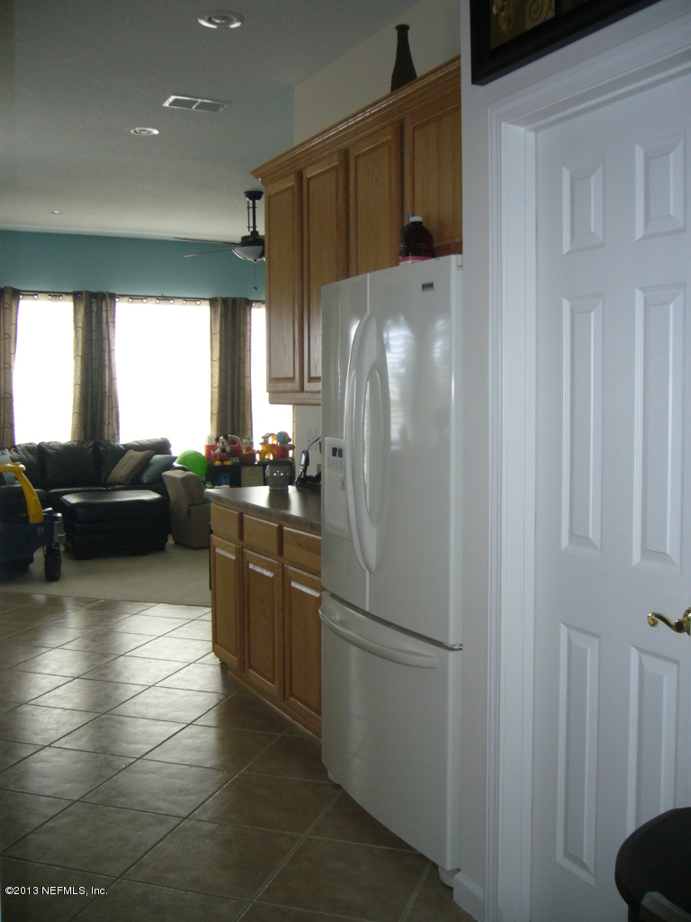780 East Red House Branch Road St. Augustine, FL 32084 - Photo 10 of 23 kitchen to family room