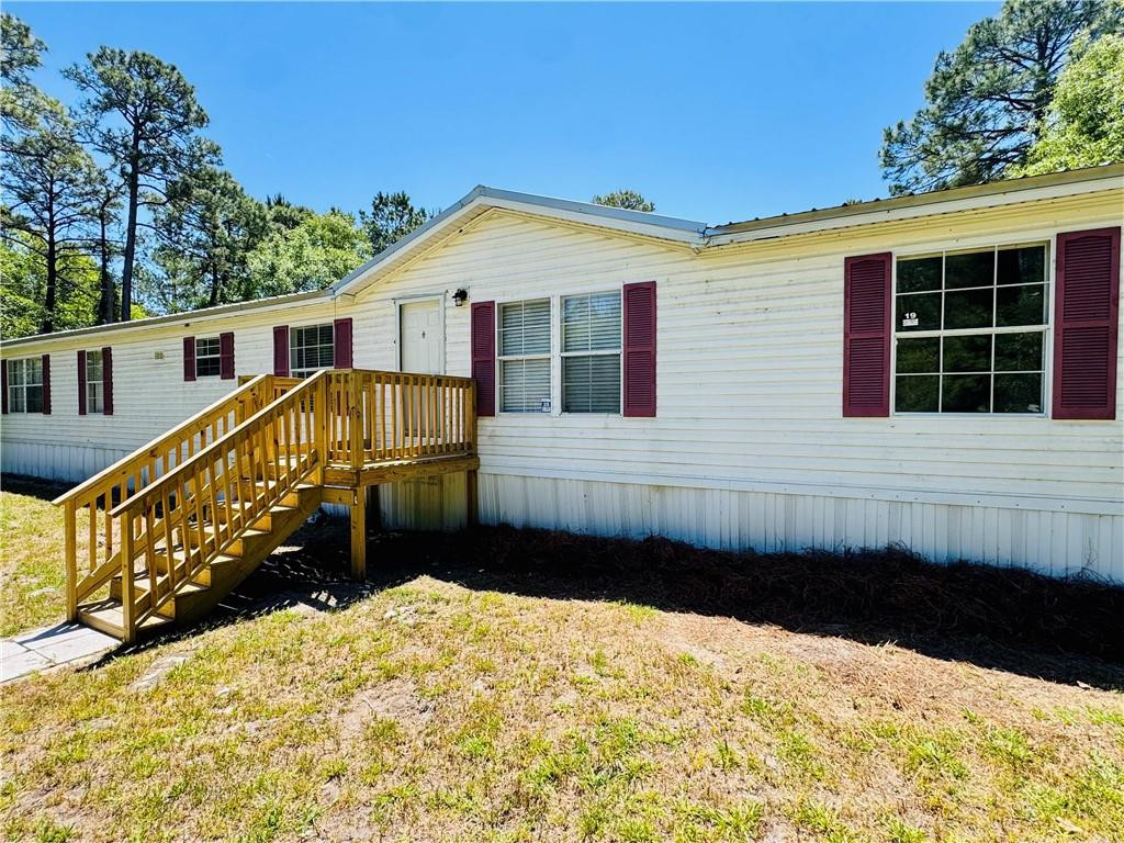 5062 Lampadoshia Road Waverly, GA 31565 - Photo 1 of 25 Font of trailer