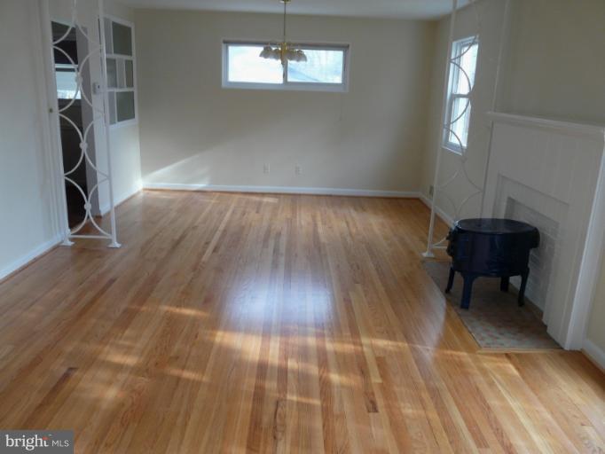 705 Stirling Road Silver Spring, MD 20901 - Photo 21 of 23 wooden floor in a room