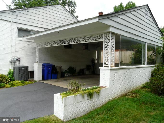 705 Stirling Road Silver Spring, MD 20901 - Photo 6 of 23 a view of house with outdoor space and a garden