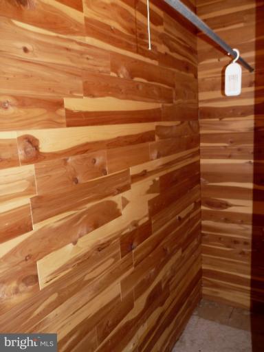 705 Stirling Road Silver Spring, MD 20901 - Photo 10 of 23 a view of a room with stairs and wooden floor