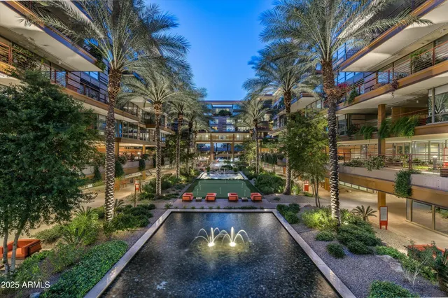 a view of swimming pool with outdoor seating