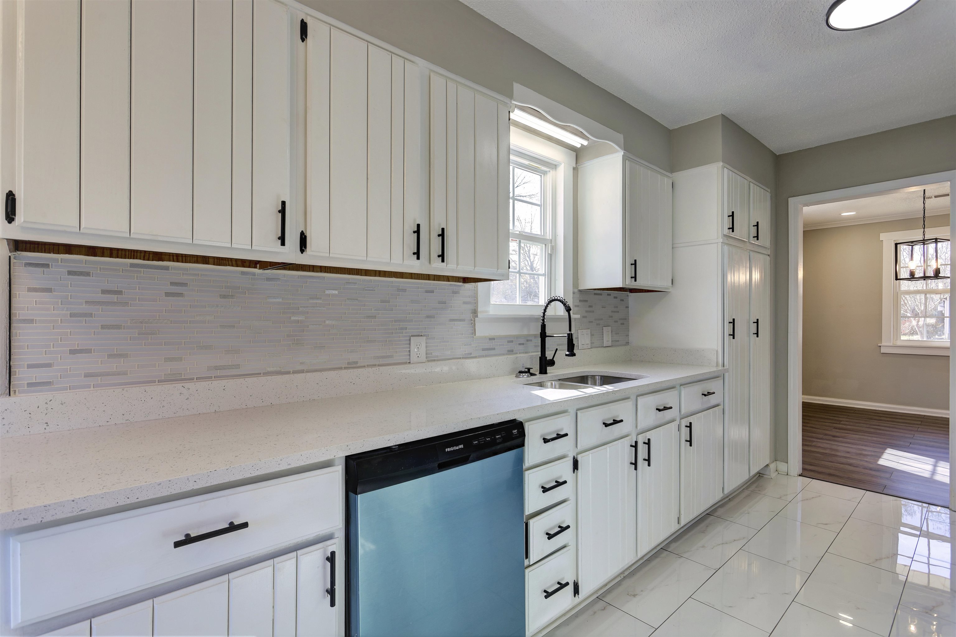 942 Wingfield Road Memphis, TN 38122 - Photo 10 of 24 a kitchen with stainless steel appliances granite countertop white cabinets and a sink