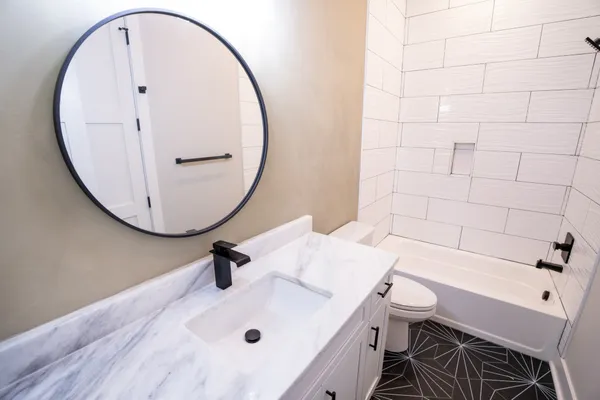 a bathroom with a sink and a toilet