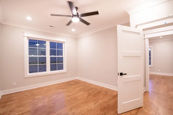 a view of kitchen with refrigerator and window