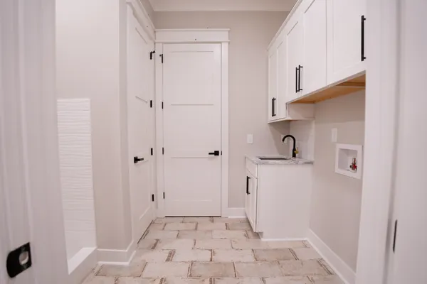 a bathroom with a sink and a shower