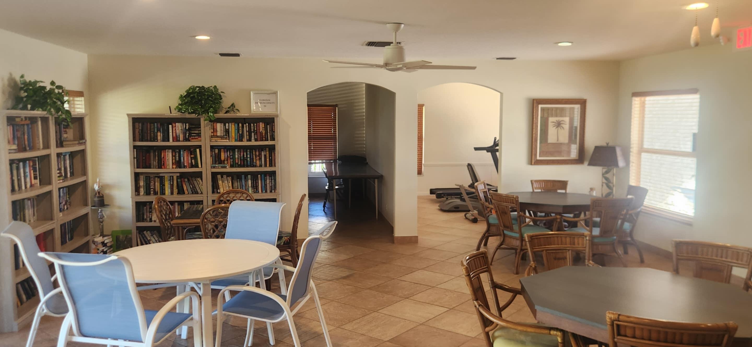 5510 North Ocean Boulevard, Unit 206 Ocean Ridge, FL 33435 - Photo 17 of 23 a view of a dining room with furniture and wooden floor