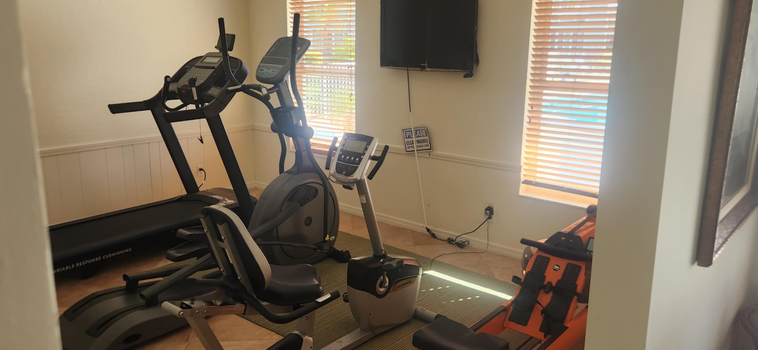 5510 North Ocean Boulevard, Unit 206 Ocean Ridge, FL 33435 - Photo 20 of 23 a view of a room with gym equipment