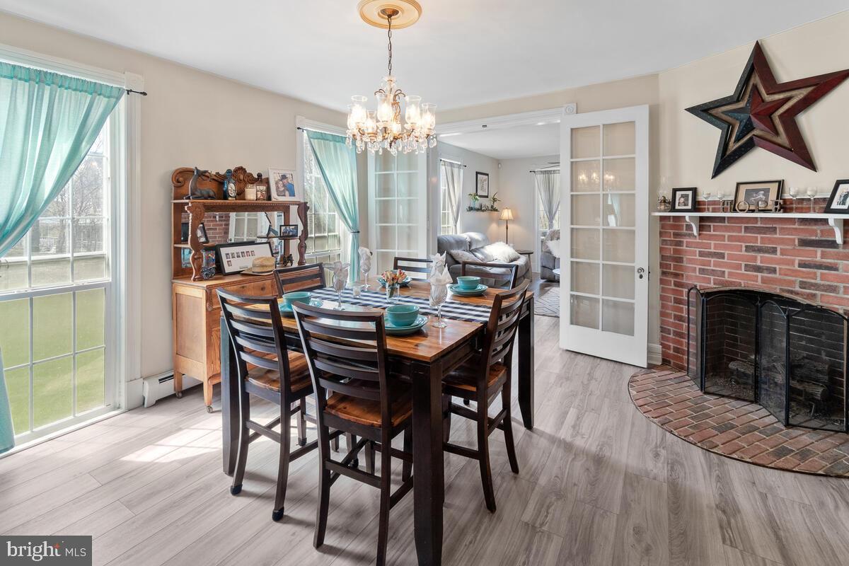 25526 Military Road Cascade, MD 21719 - Photo 10 of 59 Floor to ceiling windows-check out chandelier