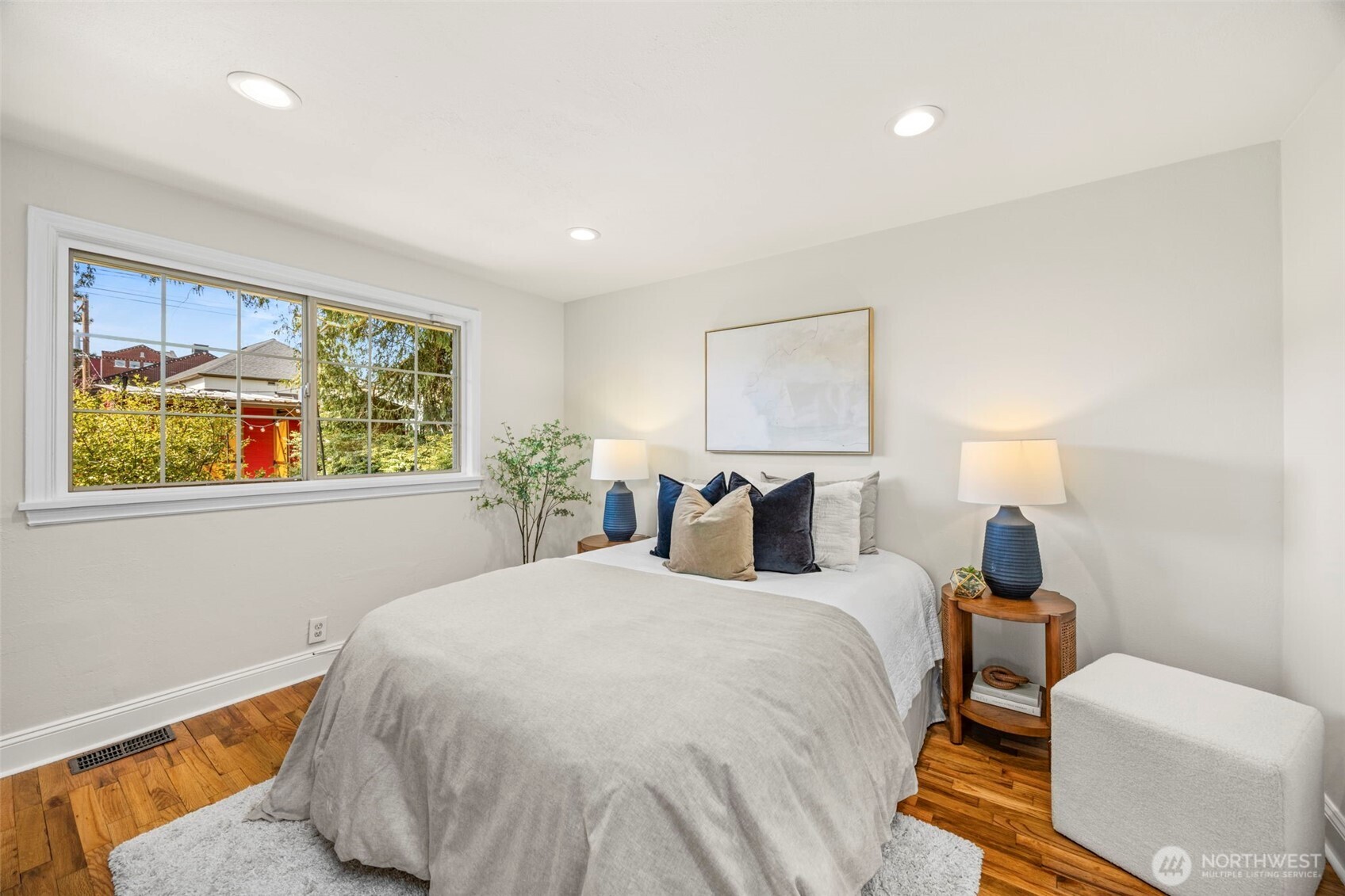 3321 35th Avenue South Seattle, WA 98144 - Photo 14 of 33 a bedroom with a bed and window