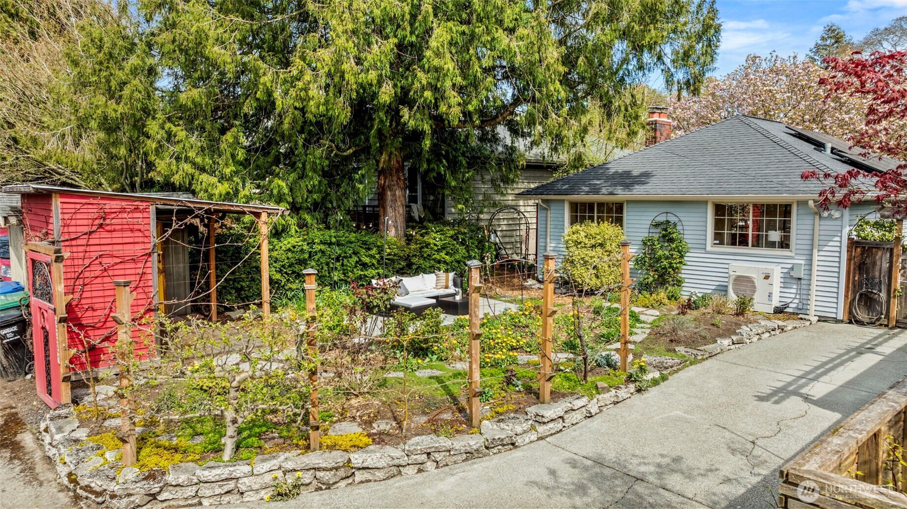 3321 35th Avenue South Seattle, WA 98144 - Photo 20 of 33 front view of a house with a bench