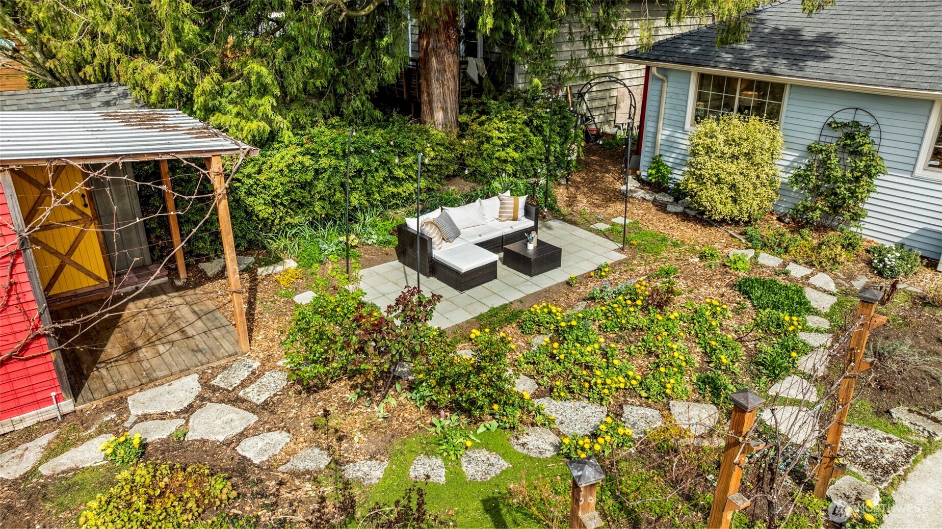 3321 35th Avenue South Seattle, WA 98144 - Photo 21 of 33 a view of a backyard with sitting area
