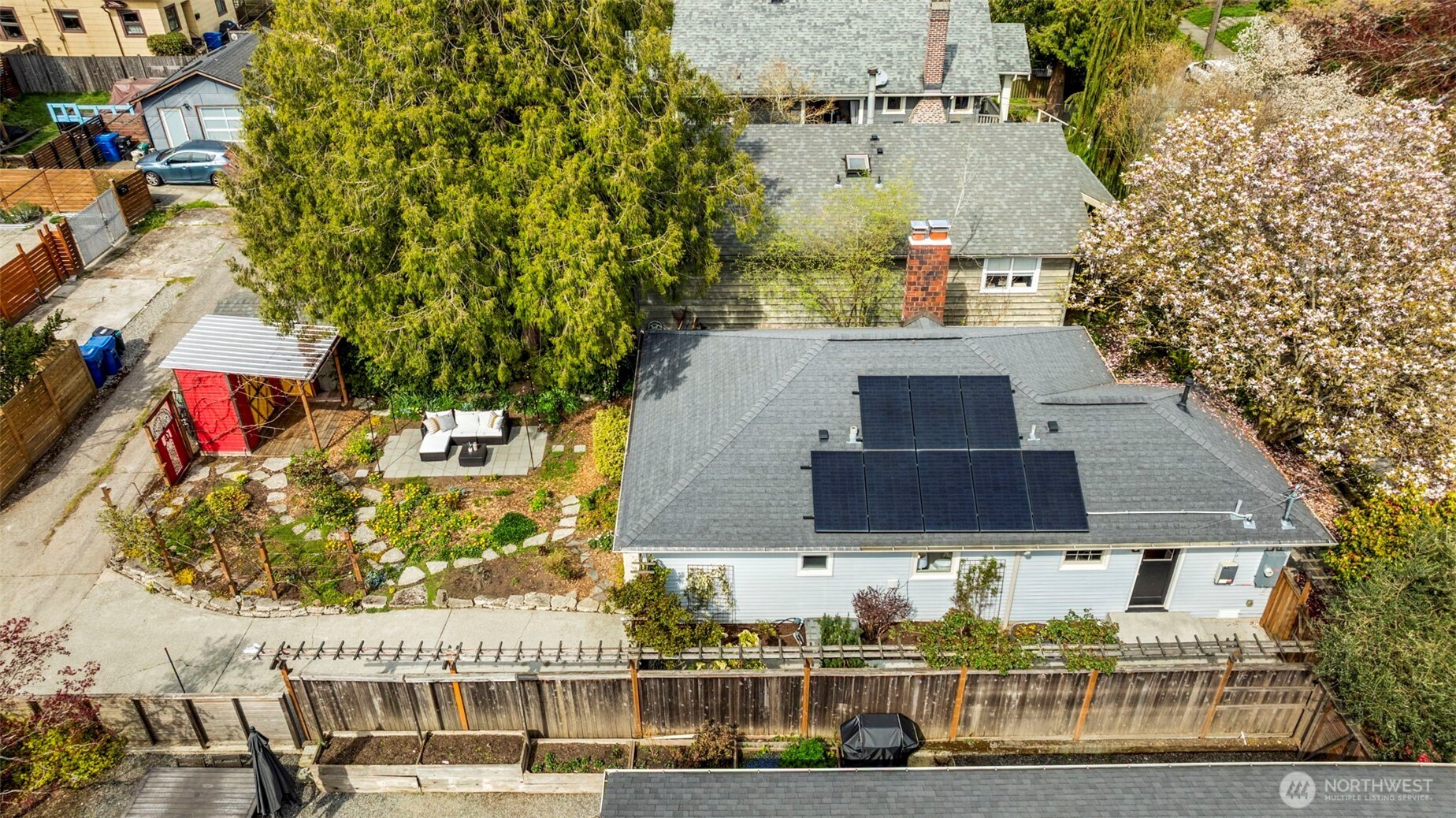 3321 35th Avenue South Seattle, WA 98144 - Photo 23 of 33 an aerial view of a house with a yard and large tree