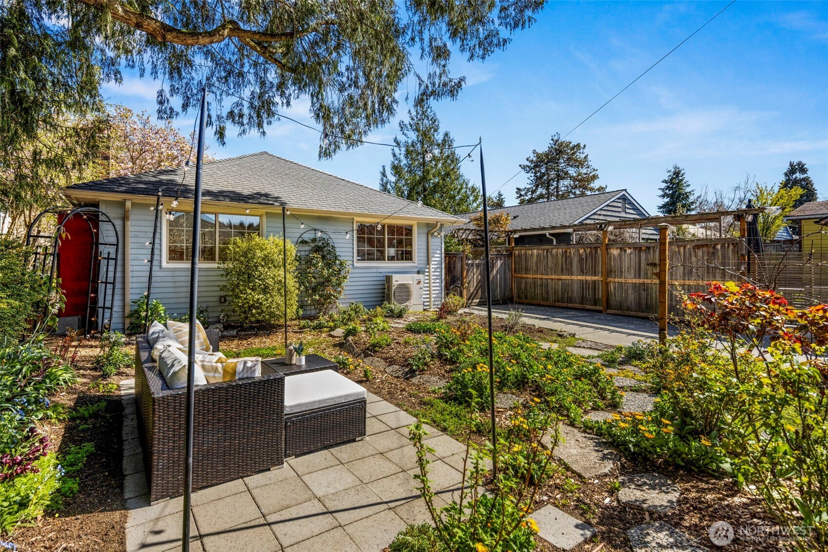 3321 35th Avenue South Seattle, WA 98144 - Photo 25 of 33 a view of a house with backyard and sitting area