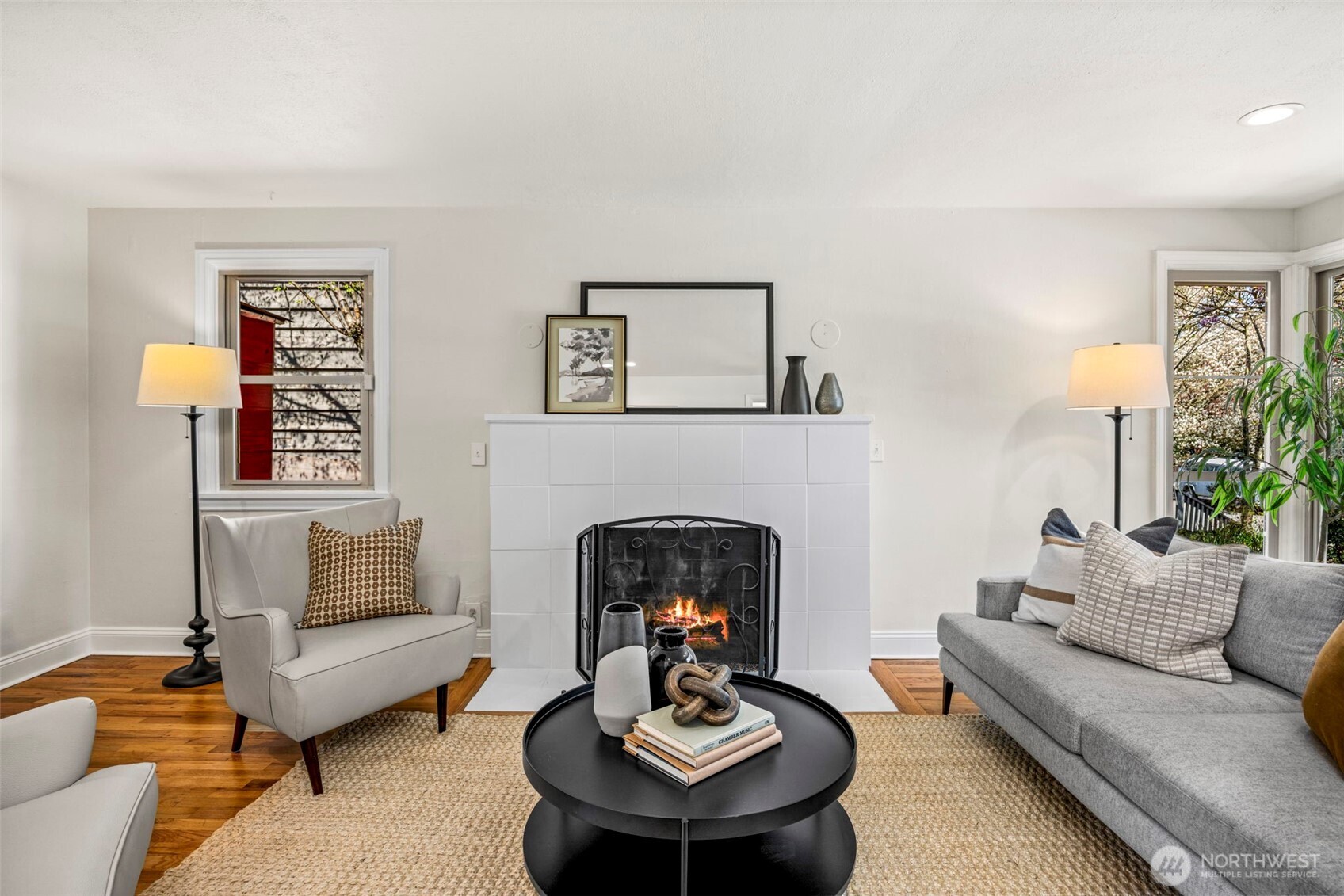 3321 35th Avenue South Seattle, WA 98144 - Photo 4 of 33 a living room with furniture and a fireplace