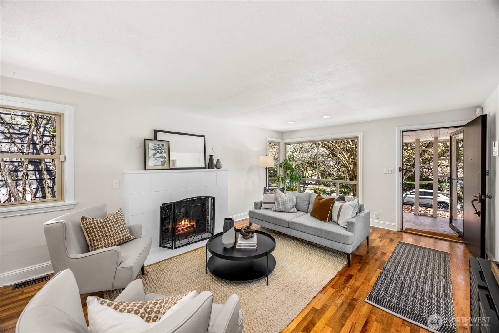 3321 35th Avenue South Seattle, WA 98144 - Photo 5 of 33 a living room with furniture and a fireplace