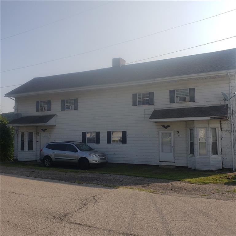 34-36 Mill Street Millsboro, PA 15348 - Photo 1 of 2 a front view of a house
