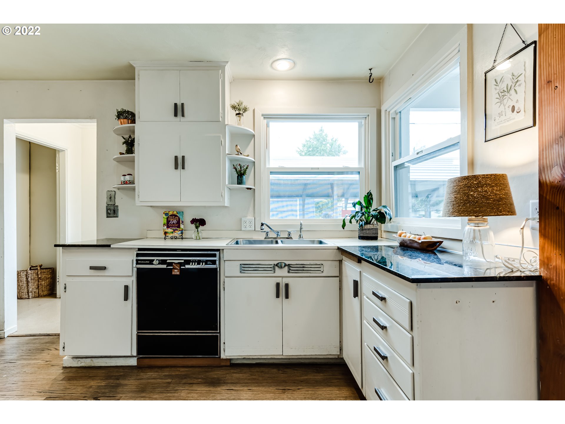 2261 5th Street Springfield, OR 97477 - Photo 11 of 27 a kitchen with stainless steel appliances granite countertop a sink stove and refrigerator