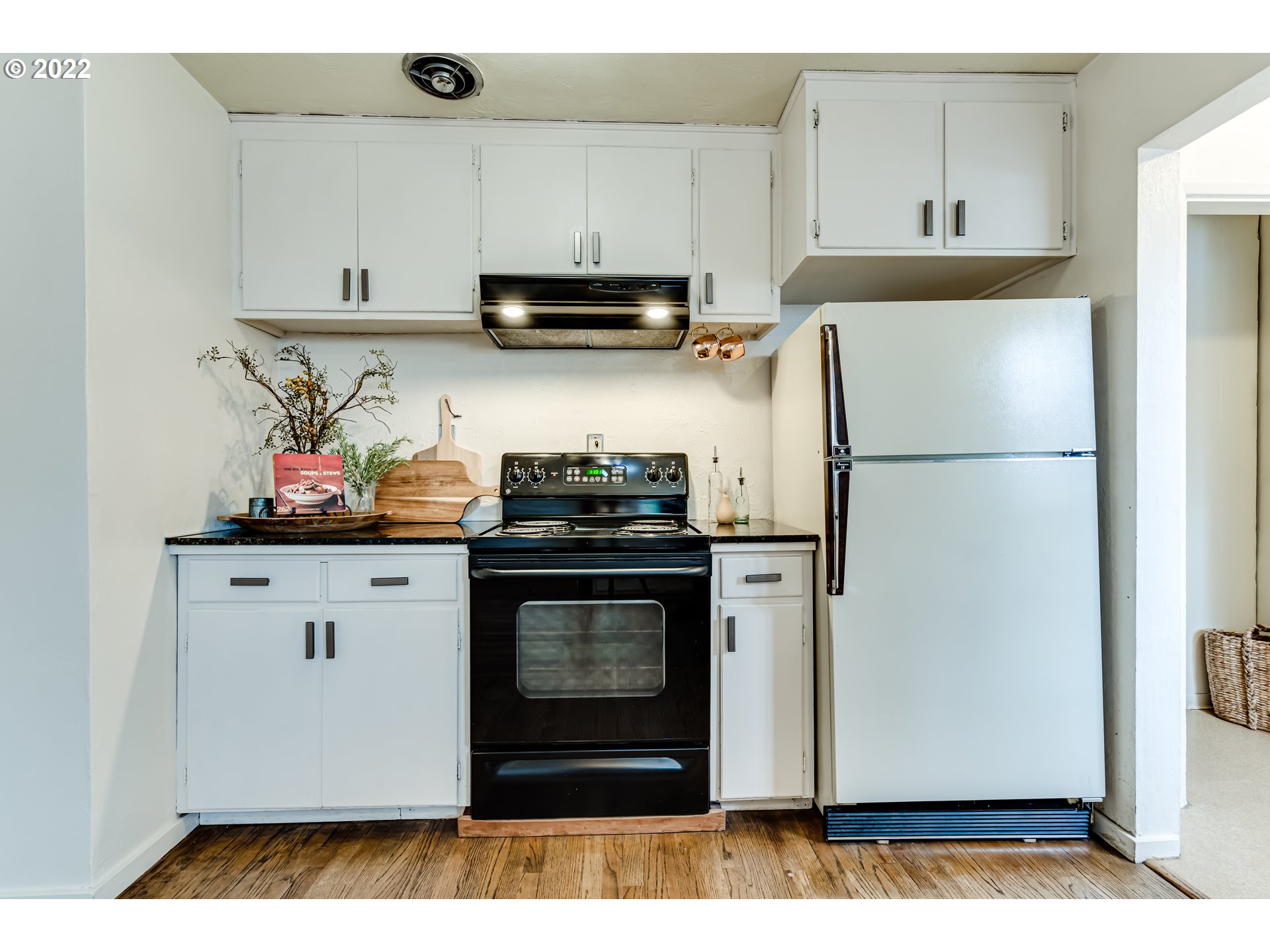 2261 5th Street Springfield, OR 97477 - Photo 14 of 27 a kitchen with stainless steel appliances granite countertop a refrigerator sink and stove