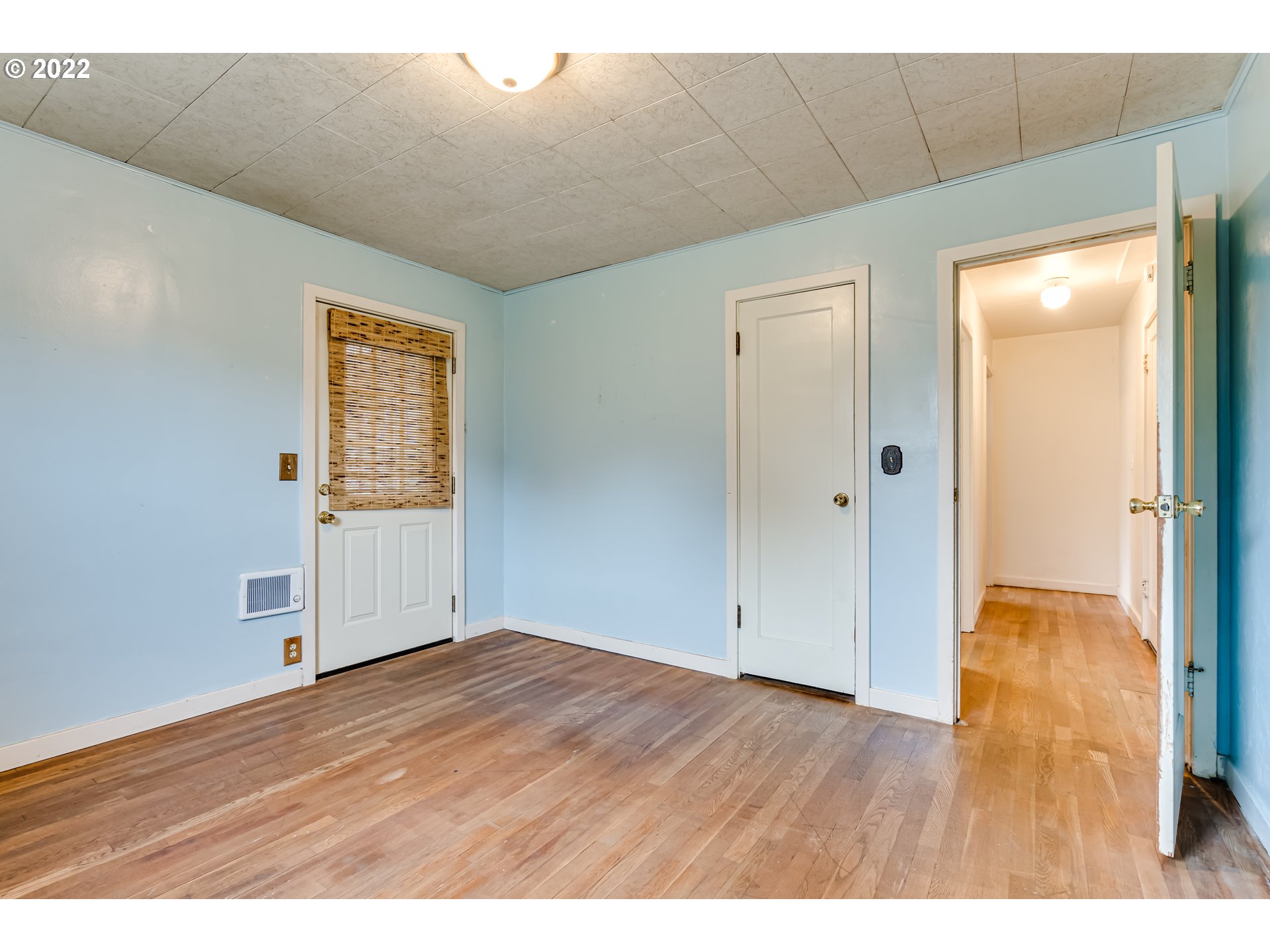 2261 5th Street Springfield, OR 97477 - Photo 16 of 27 a view of an empty room with wooden floor