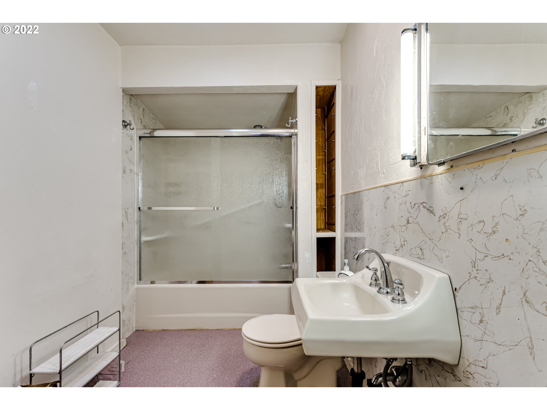 2261 5th Street Springfield, OR 97477 - Photo 18 of 27 a bathroom with a sink toilet and shower