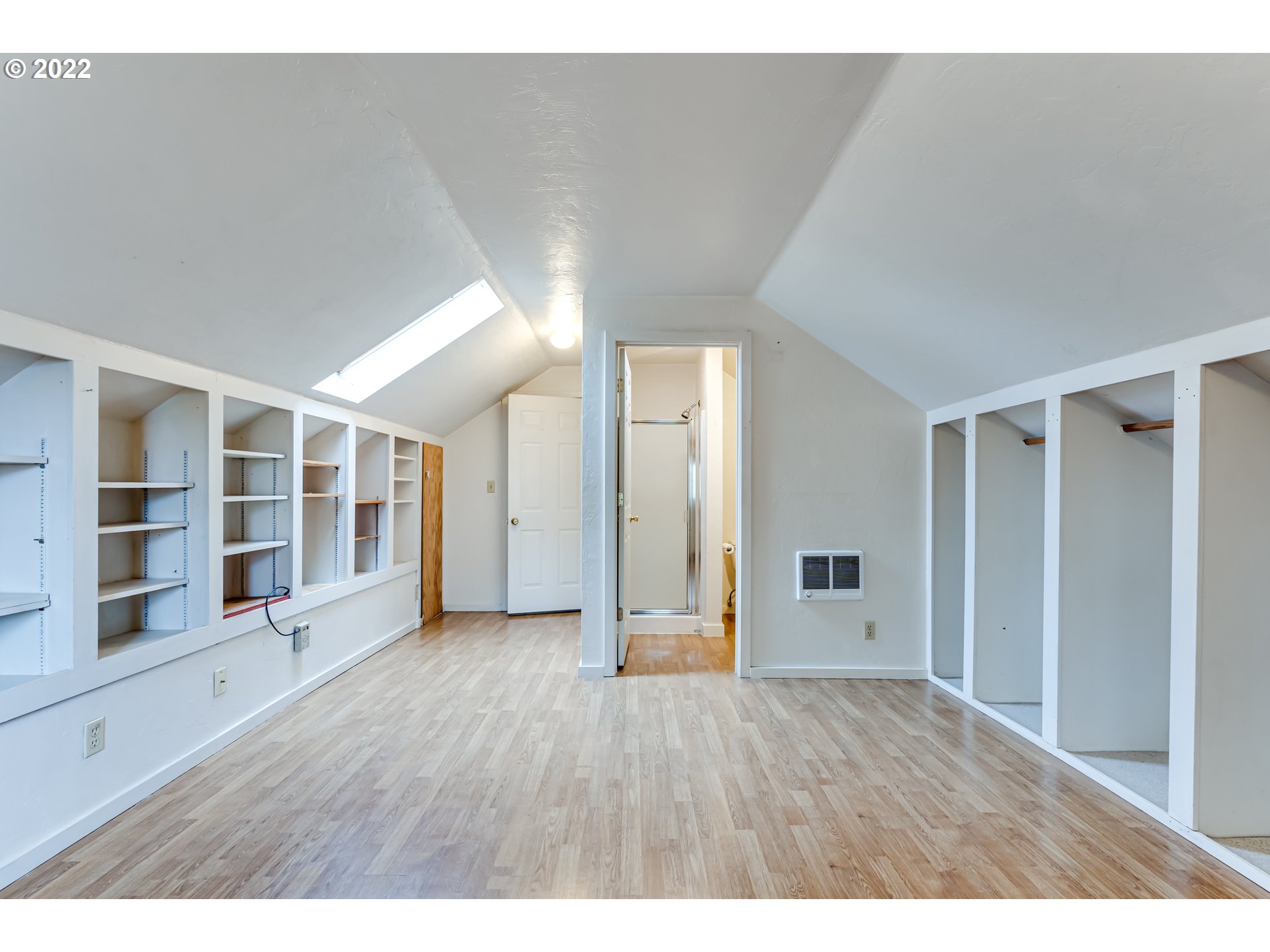 2261 5th Street Springfield, OR 97477 - Photo 21 of 27 a view of an empty room with wooden floor and closet