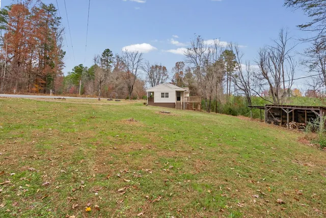 a large tree in front of a house