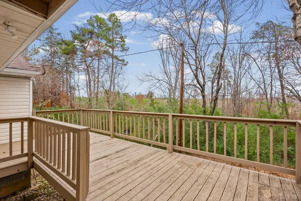 a view of a wooden roof deck